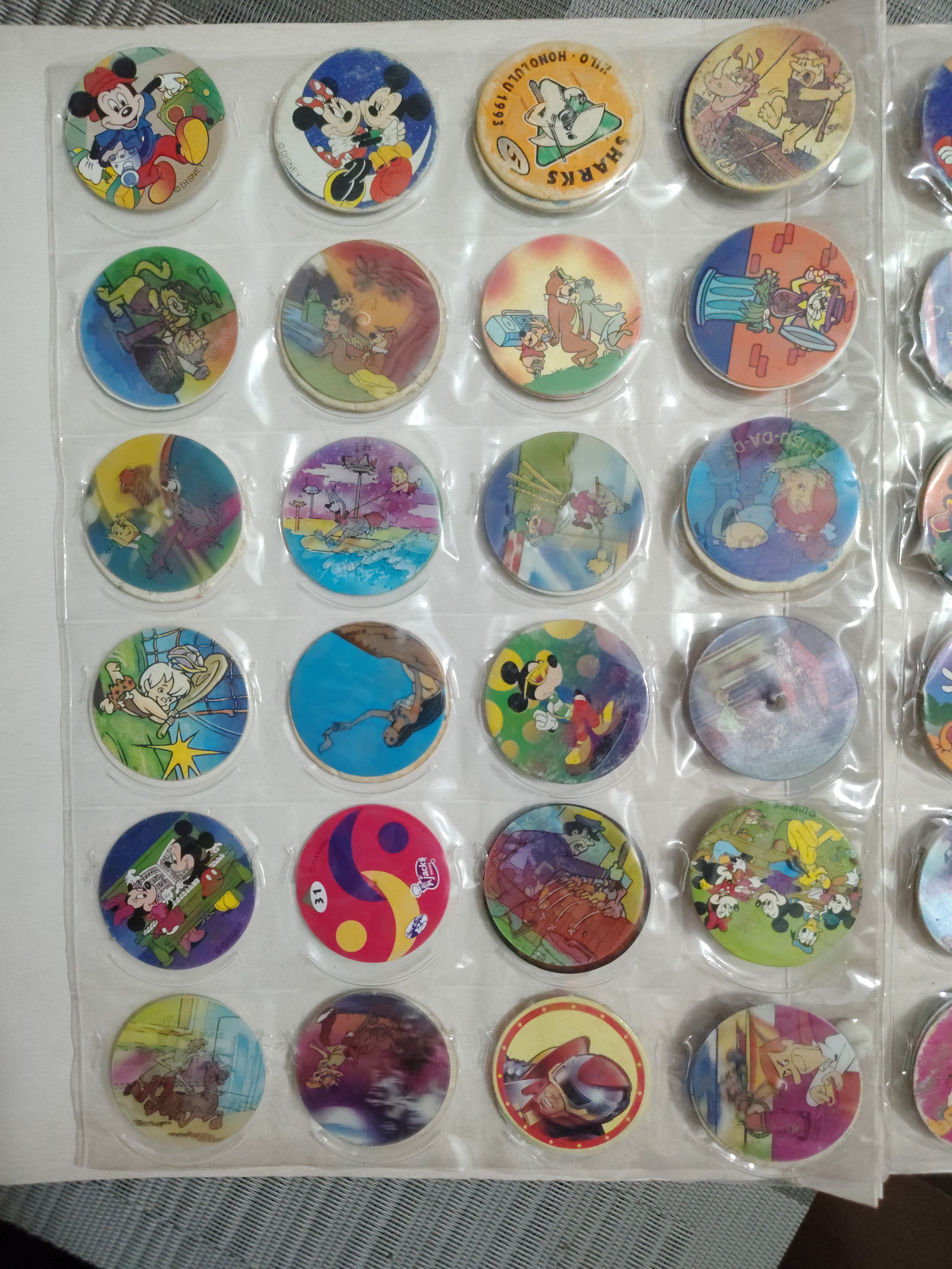 Lote de Tazos Vintage Variados (Picapiedra, Supersónicos, Don Gato y Su Pandilla, Mickey y más) + Álbum