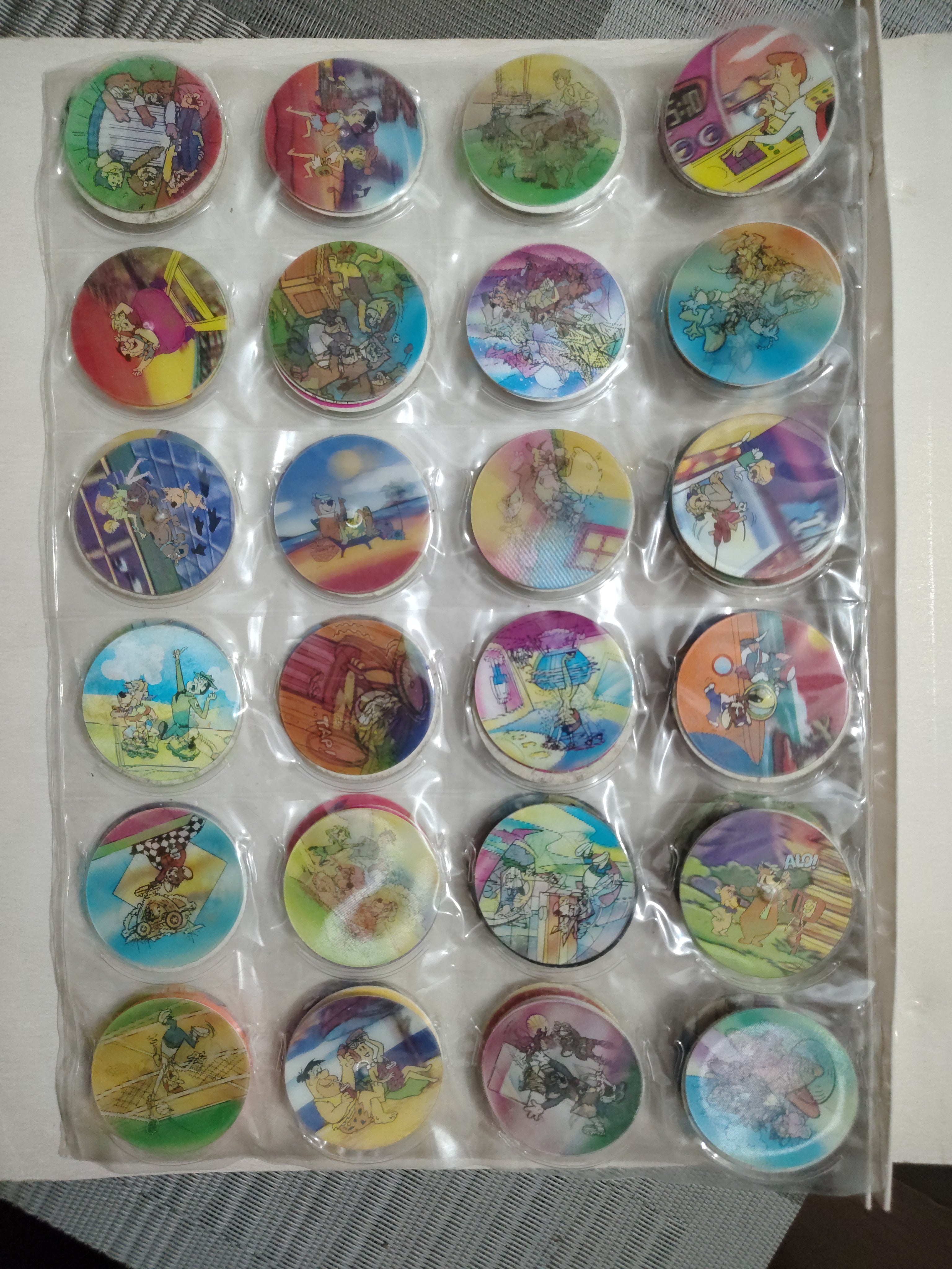 Lote de Tazos Vintage Variados (Picapiedra, Supersónicos, Don Gato y Su Pandilla, Mickey y más) + Álbum